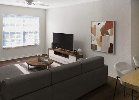 a living room with a couch and a television
