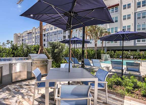 Outdoor kitchen grilling area at The Exchange Luxury Apartments in St. Petersburg, FL