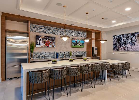 Clubhouse kitchen at The Exchange Luxury Apartments in St. Petersburg, FL