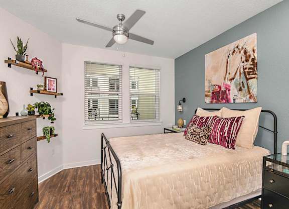 Bedroom with ceiling fan at The Foundry Luxury Apartments in Tampa FL
