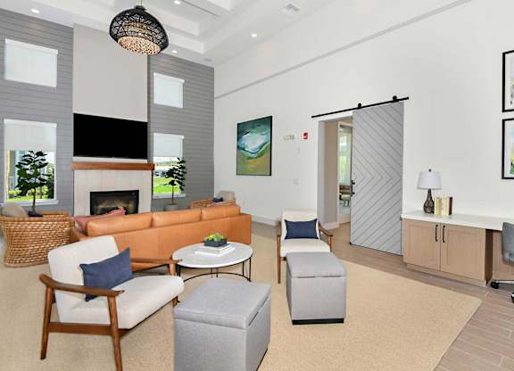 Library with Fireplace and Computer Stations at The Gallery Luxury Apartments in Trinity, FL