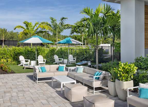 Poolside Patio at Everly Apartments in Naples, FL
