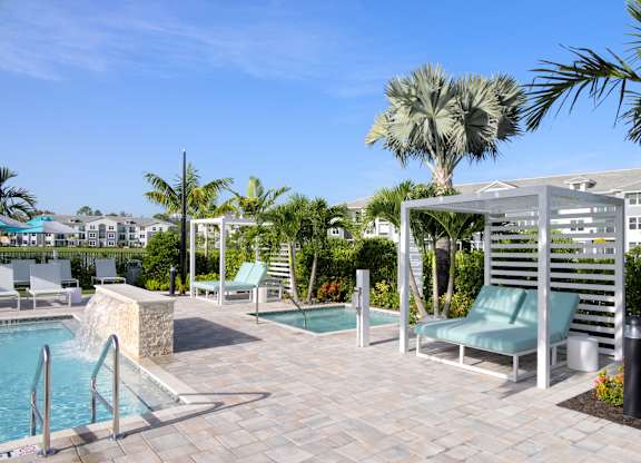 Pool Deck with Heated Spa at Everly Apartments in Naples, FL