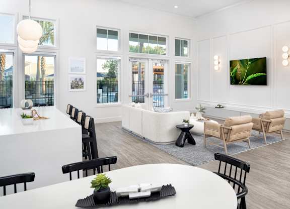 Club Room with Lounge Seating at Jackson Palms Affordable Apartments in Jacksonville FL