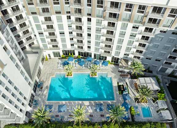 Resort-Inspired Pool Deck at The Marc Luxury Apartments in Palm Beach Gardens FL