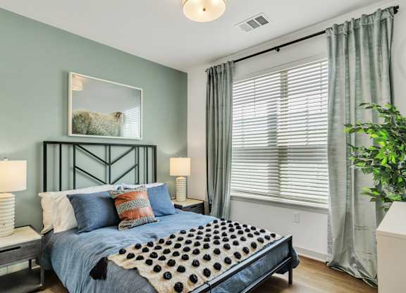 a bedroom at Apex apartments in Colorado Springs, CO