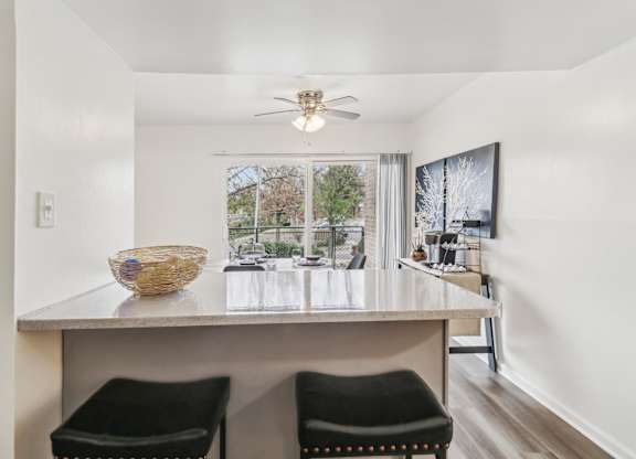 a kitchen with a counter top and a large window at Oaks at Oxon Hill, Oxon Hill, Maryland