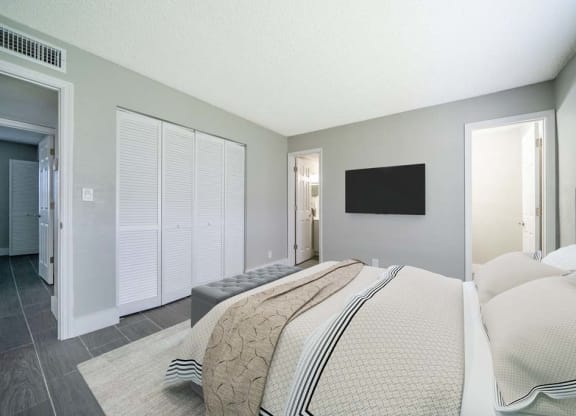Bedroom with cozy bed at Piper Village West, Florida