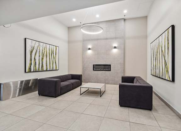 a living room with two couches and a coffee table