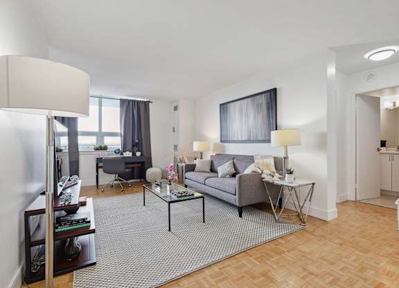 a living room with a couch and a table