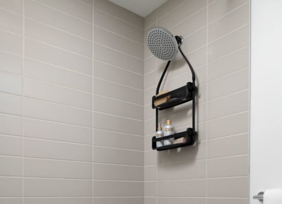a bathroom with a bath tub and a towel on the tub