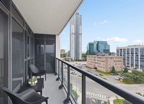 a balcony or terrace with a view of the city