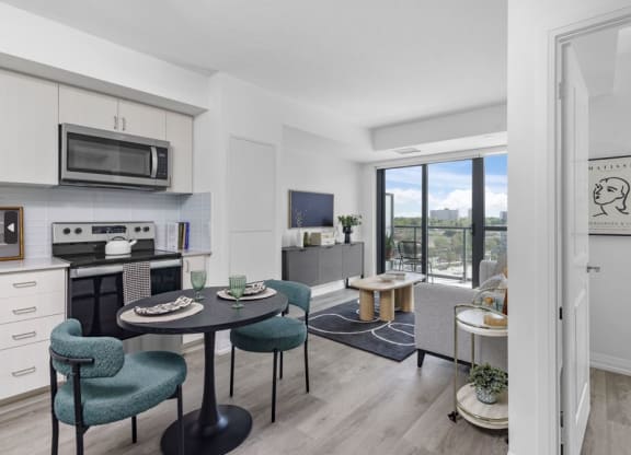 an apartment with a kitchen and a living room