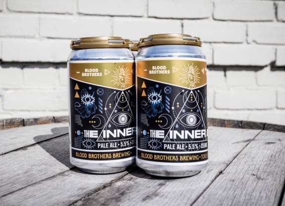 two cans of blood brothers beer