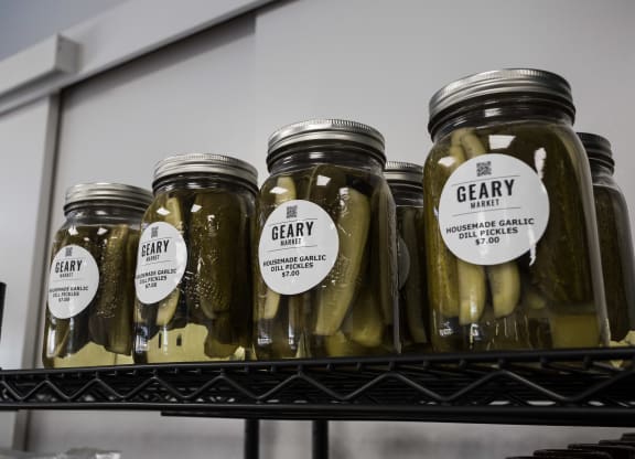 jars of pickles on a shelf