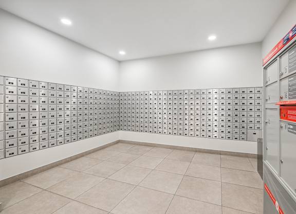 the laundry room has tile flooring and stainless steel appliances