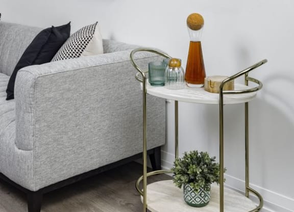 a living room with a couch and a table
