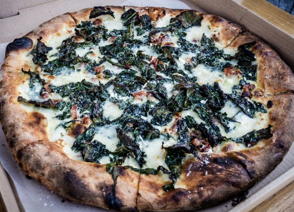 white pizza with spinach
