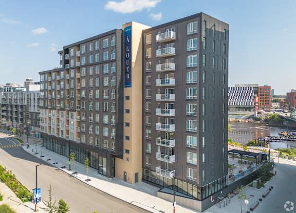A modern apartment building with the name