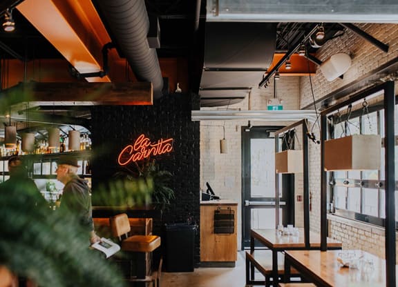 a restaurant with a coca cola sign on the wall