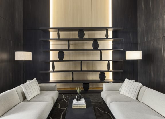 a living room with two couches and a coffee table
