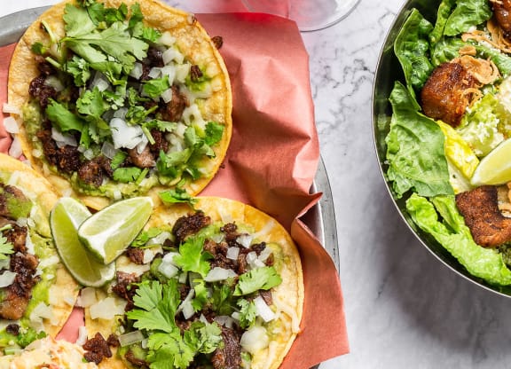 beef tacos on a plate, hamburger and fries