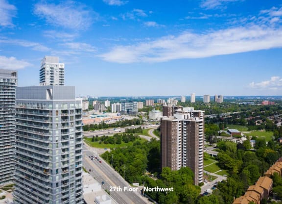 a view of the city from the top of a skyscraper