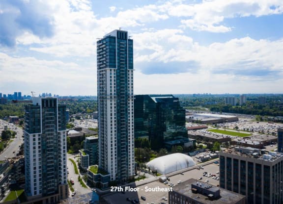 an aerial view of a city with tall buildings and skyscrapers