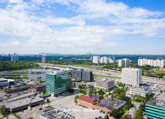 a view of the city from the roof of a building