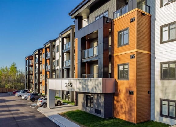 modern apartment building on the corner of a street