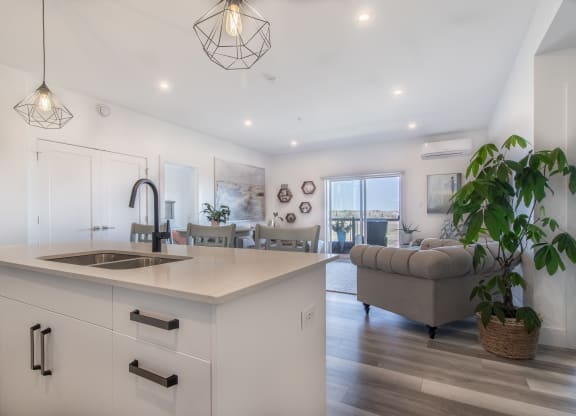 an open floor plan with a kitchen and living room
