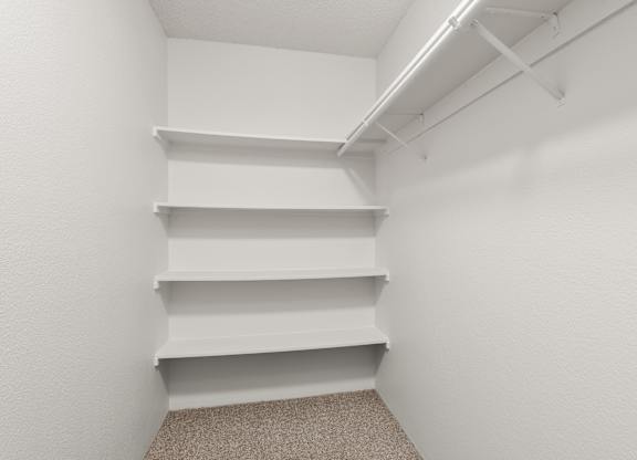 Walk in Closet of Upstairs Unit with Upgraded Amenities