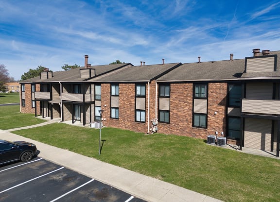 our apartments feature a spacious courtyard with grass