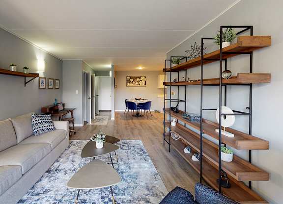 a living room with a couch and a table