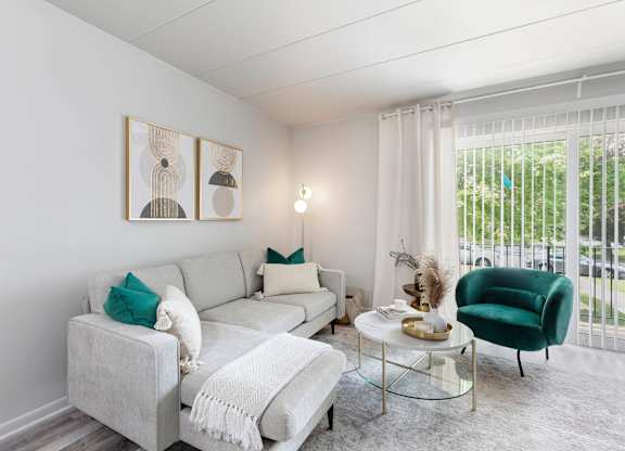 a living room with a couch and a table