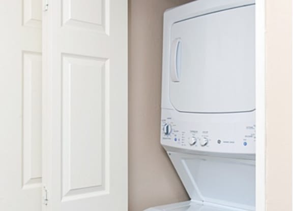 A white in-unit wash and dryer machine