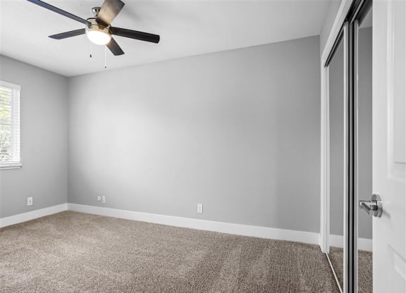 Carpeted Bedroom Space at Peninsula Pines Apartments, South San Francisco, CA