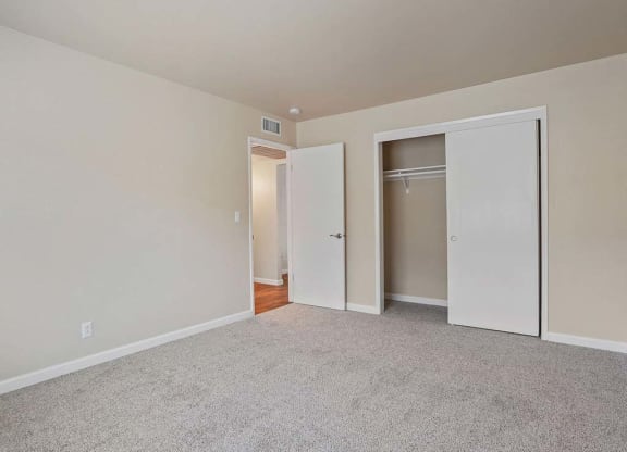 Carpeted Bedroom Area at Parkside Apartments, Davis