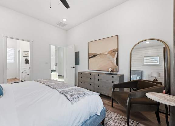 Bedroom with a large bed at Alante Homes at Spring Run, Idaho