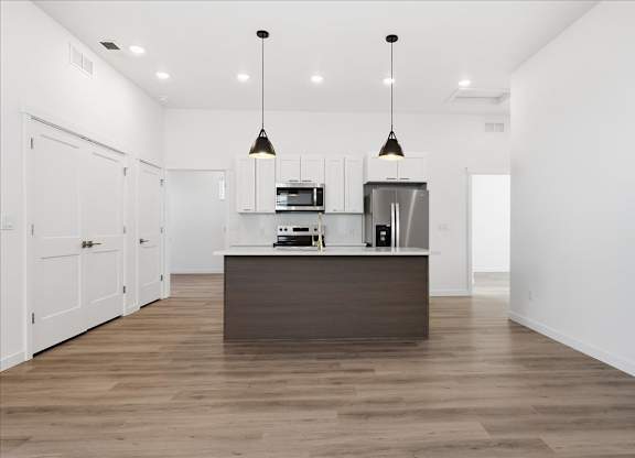 Kitchen with a wooden island at Alante Homes at Spring Run, Caldwell, Idaho