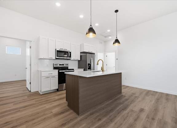 Kitchen with ambient lights at Alante Homes at Spring Run, Caldwell, ID