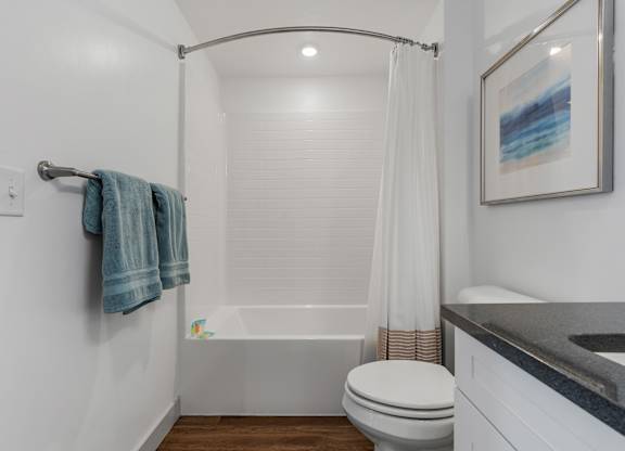 White bathroom with bathtub at City View St. George, Utah