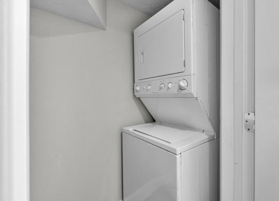 Stacked washer dryer at Avia Apartments at Reedy Creek, Florida