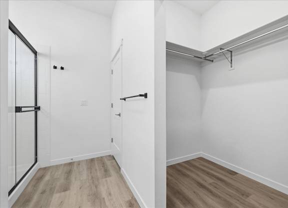 Bathroom with attached closet at Alante Homes at Spring Run, Caldwell, ID