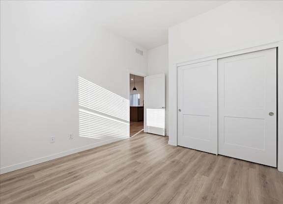 Unfurnished bedroom with wooden floor at Alante Homes at Spring Run, Caldwell, ID