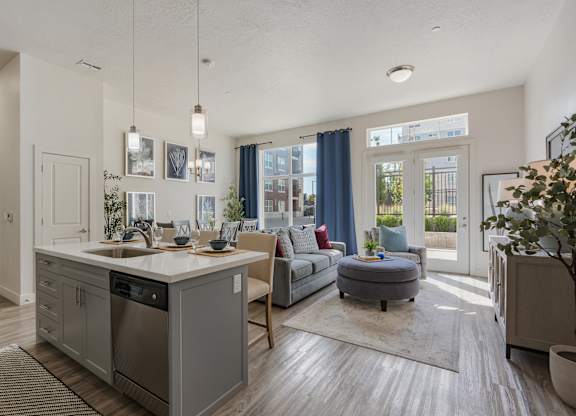 an open floor plan with a kitchen and living room at 200 City View, Provo, Utah