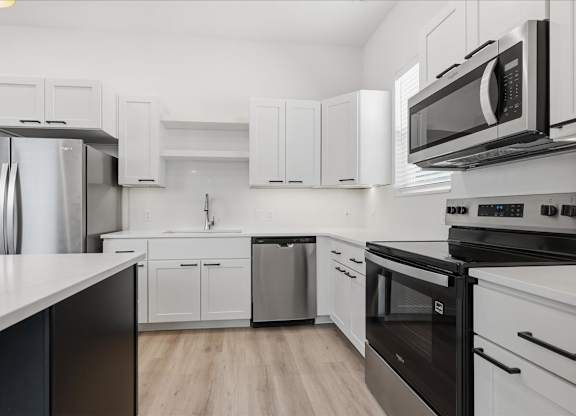 Modern kitchen with stove top oven at Alante Homes at Spring Run, Caldwell, 83607