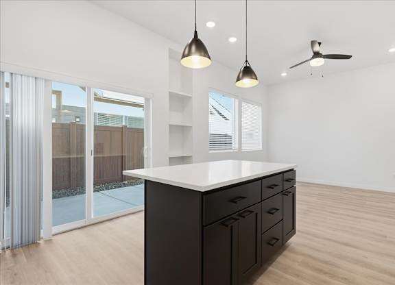 Kitchen with island and lights at Alante Homes at Spring Run, Idaho