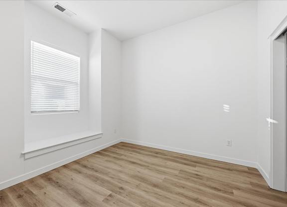 Room with window and blinds at Alante Homes at Spring Run, Caldwell, 83607