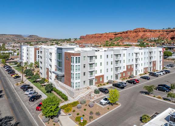 Apartment view from the top showing parking lot and cars 605 Place Student Housing & Co-Living, St George
